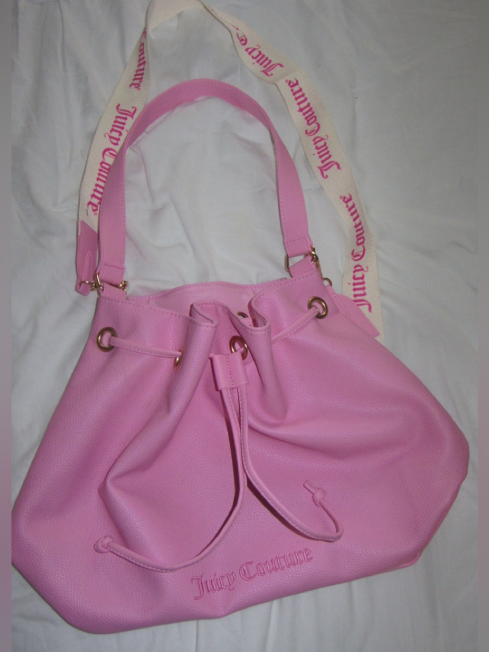 Juicy Couture Light Pink Drawstring Shoulder Bag with Branded Strap